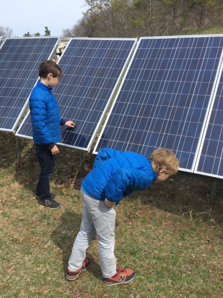 boys with solar panels