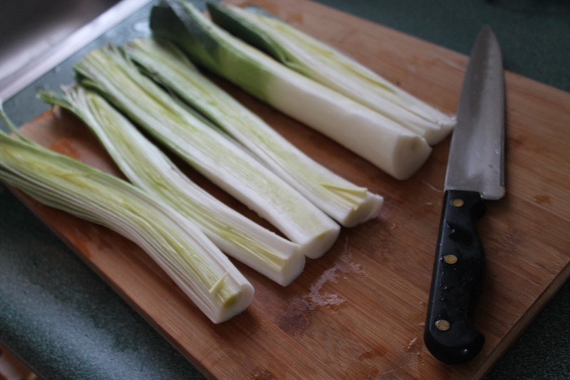 Leeks on cutting board, by Izabela Rutkowski